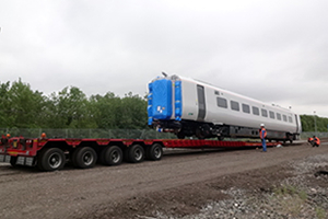 Unloading work being carried out using the temporary ramp for when on the rails