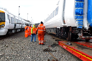 Unloading work being carried out using the temporary ramp for when on the rails