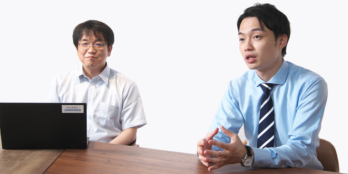 脱炭素ソリューションのインタビューに答える日立物流の森尾氏と半澤氏